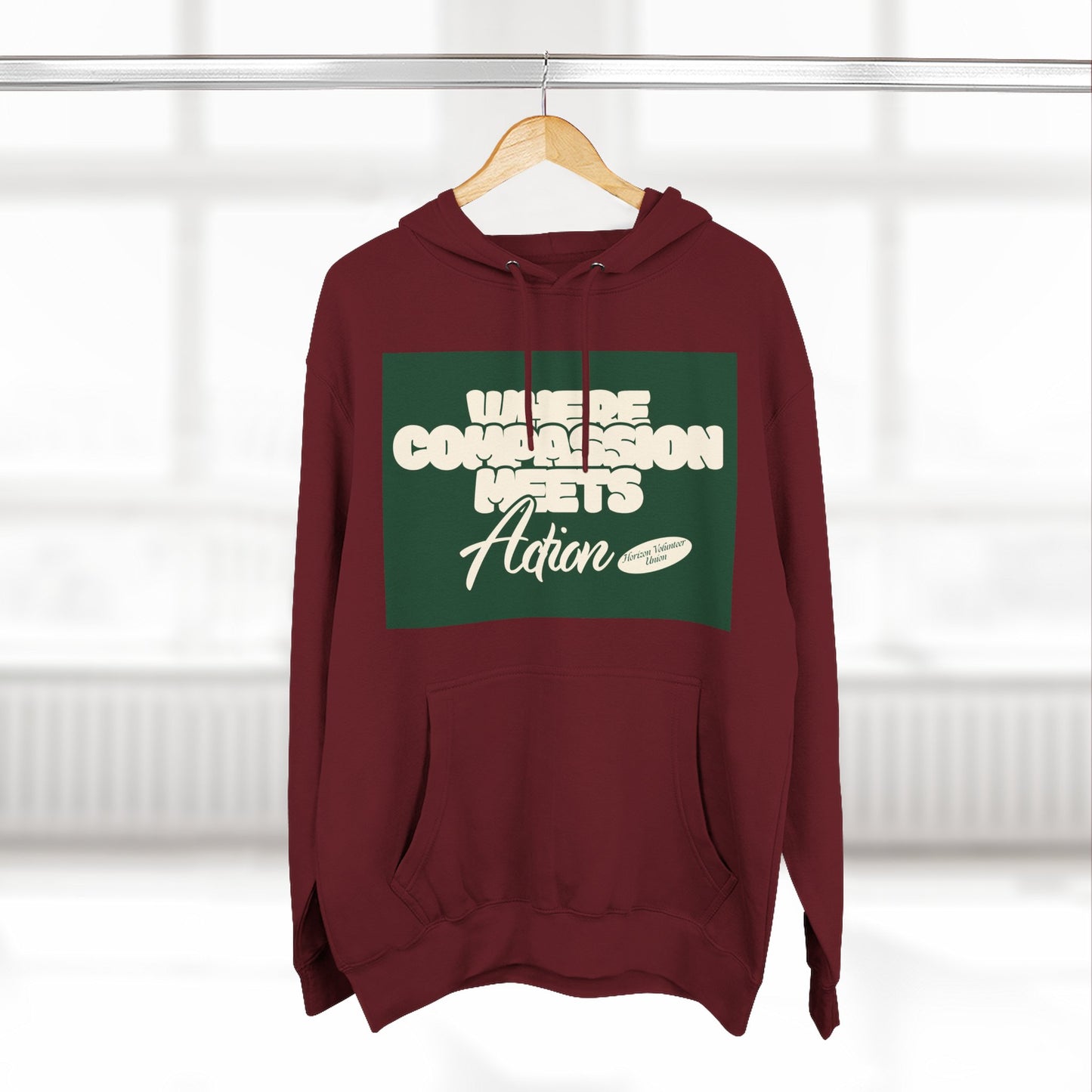 Three-Panel Fleece Hoodie — Vintage Ship Graphic & "Where Compassion Meets Action" Motivational Design