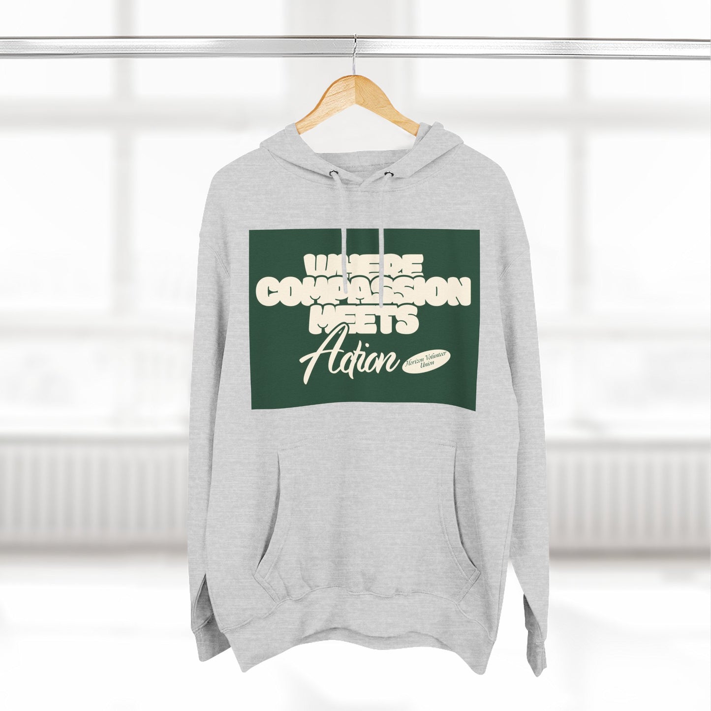 Three-Panel Fleece Hoodie — Vintage Ship Graphic & "Where Compassion Meets Action" Motivational Design