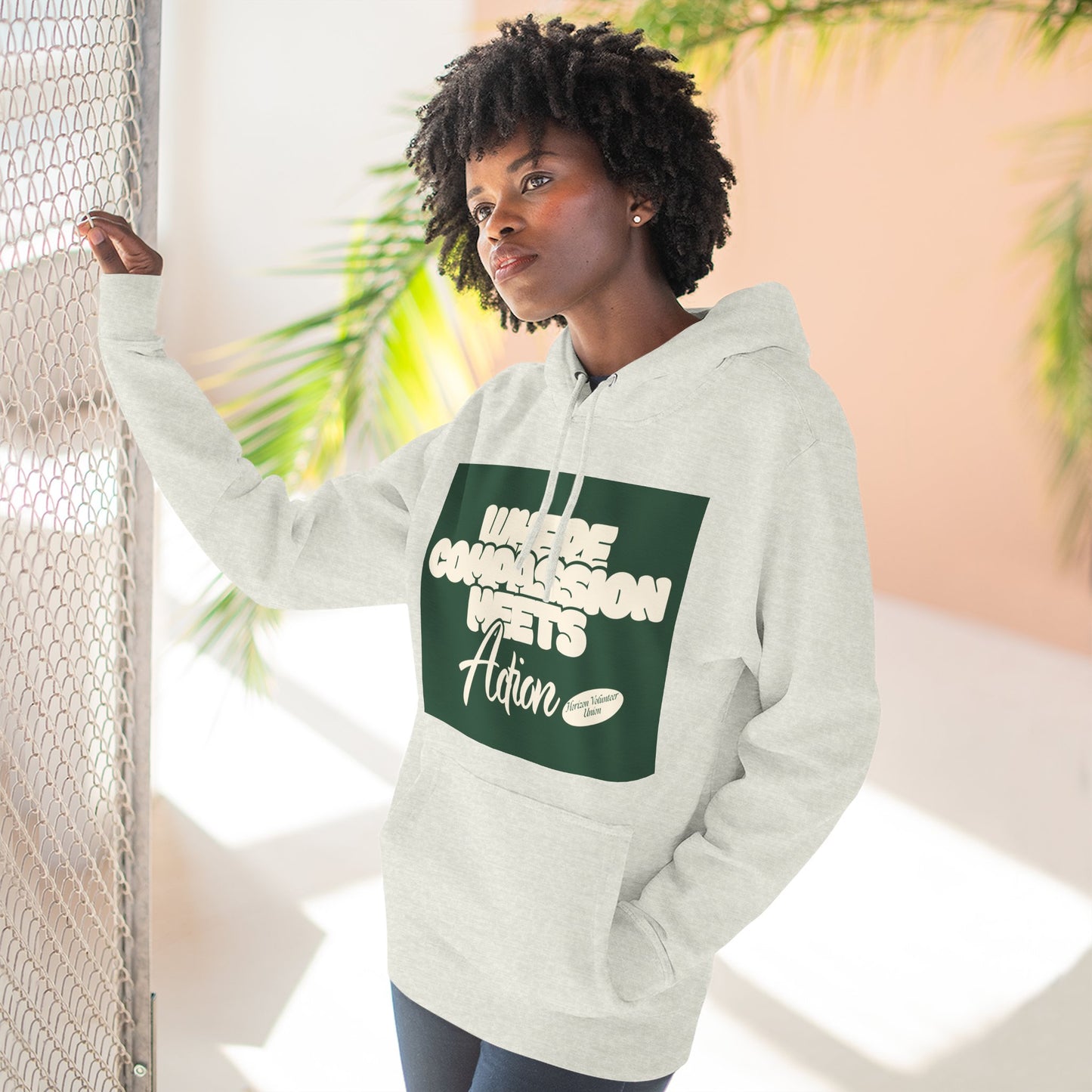 Three-Panel Fleece Hoodie — Vintage Ship Graphic & "Where Compassion Meets Action" Motivational Design