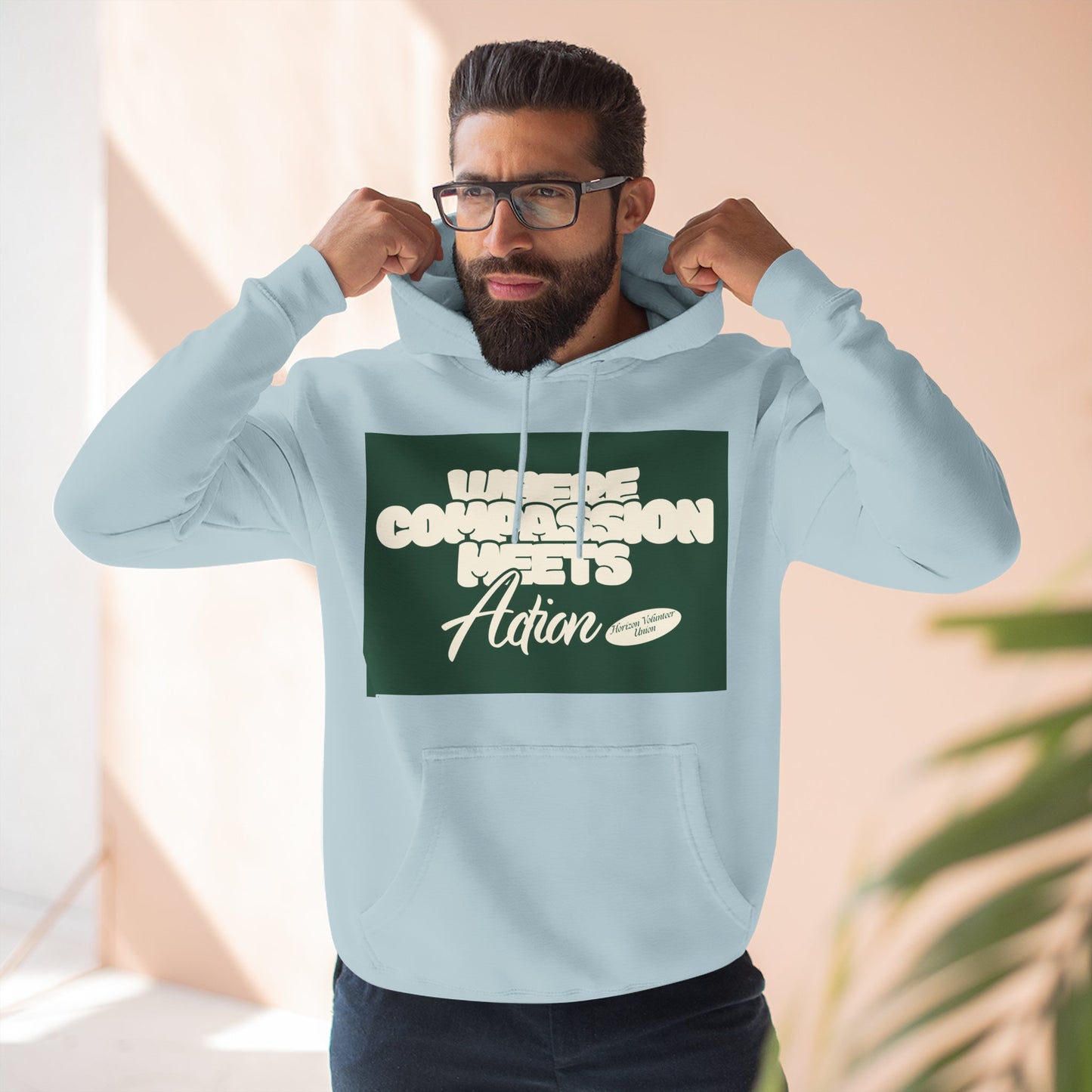 Three-Panel Fleece Hoodie — Vintage Ship Graphic & "Where Compassion Meets Action" Motivational Design